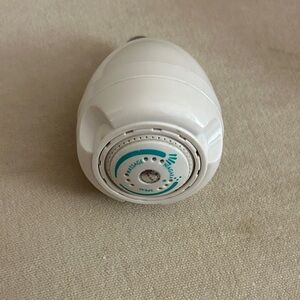 Shower Head Attachment to reduce water consumption